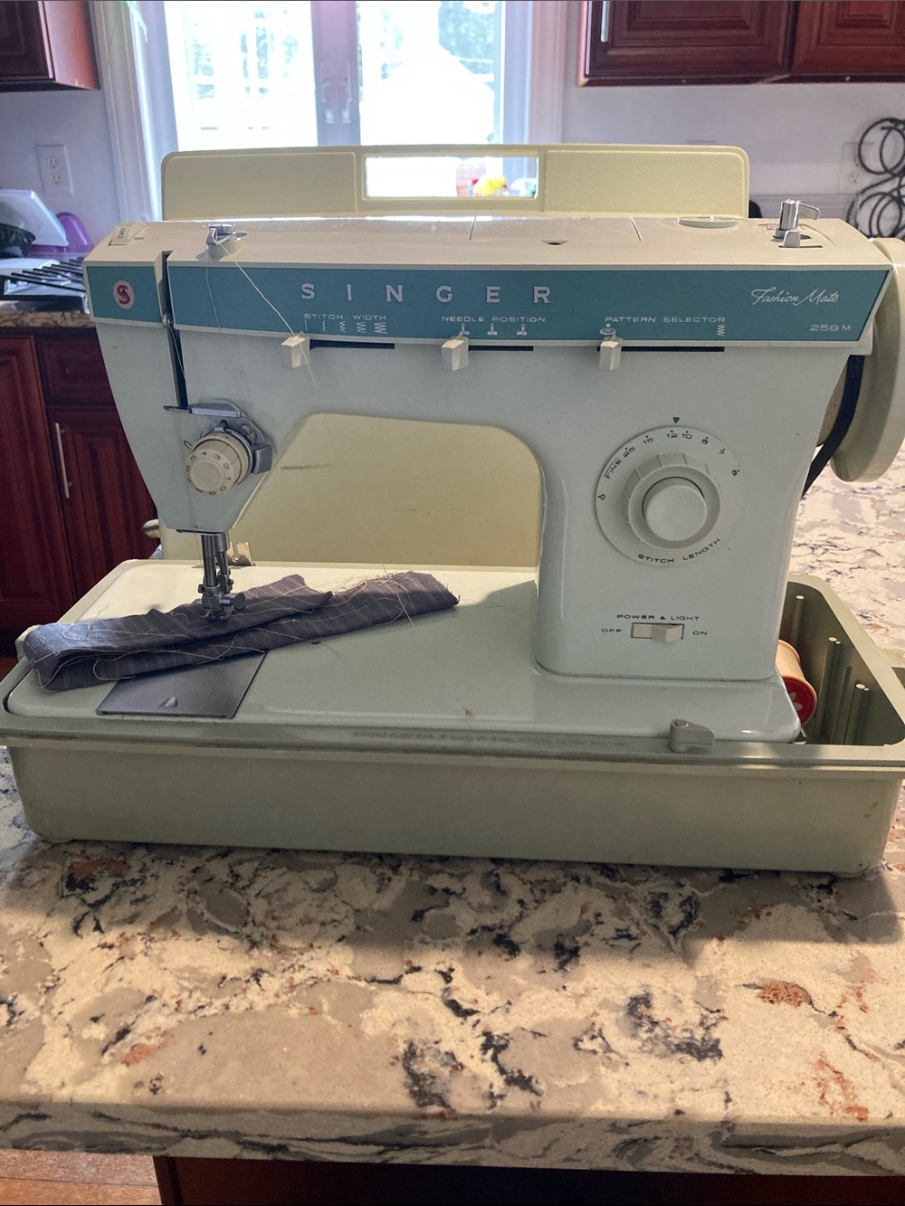 Singer Sewing Machine in Light Blue - Reliable Home Stitching